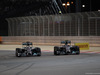 GP BAHRAIN, 06.04.2014- Gara, Lewis Hamilton (GBR) Mercedes AMG F1 W05 fighting with Nico Rosberg (GER) Mercedes AMG F1 W05