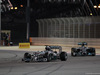 GP BAHRAIN, 06.04.2014- Gara, Lewis Hamilton (GBR) Mercedes AMG F1 W05 fighting with Nico Rosberg (GER) Mercedes AMG F1 W05