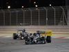 GP BAHRAIN, 06.04.2014- Gara, Lewis Hamilton (GBR) Mercedes AMG F1 W05 fighting with Nico Rosberg (GER) Mercedes AMG F1 W05