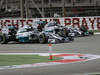 GP BAHRAIN, 06.04.2014- Gara, Nico Rosberg (GER) Mercedes AMG F1 W05 in fight with Lewis Hamilton (GBR) Mercedes AMG F1 W05