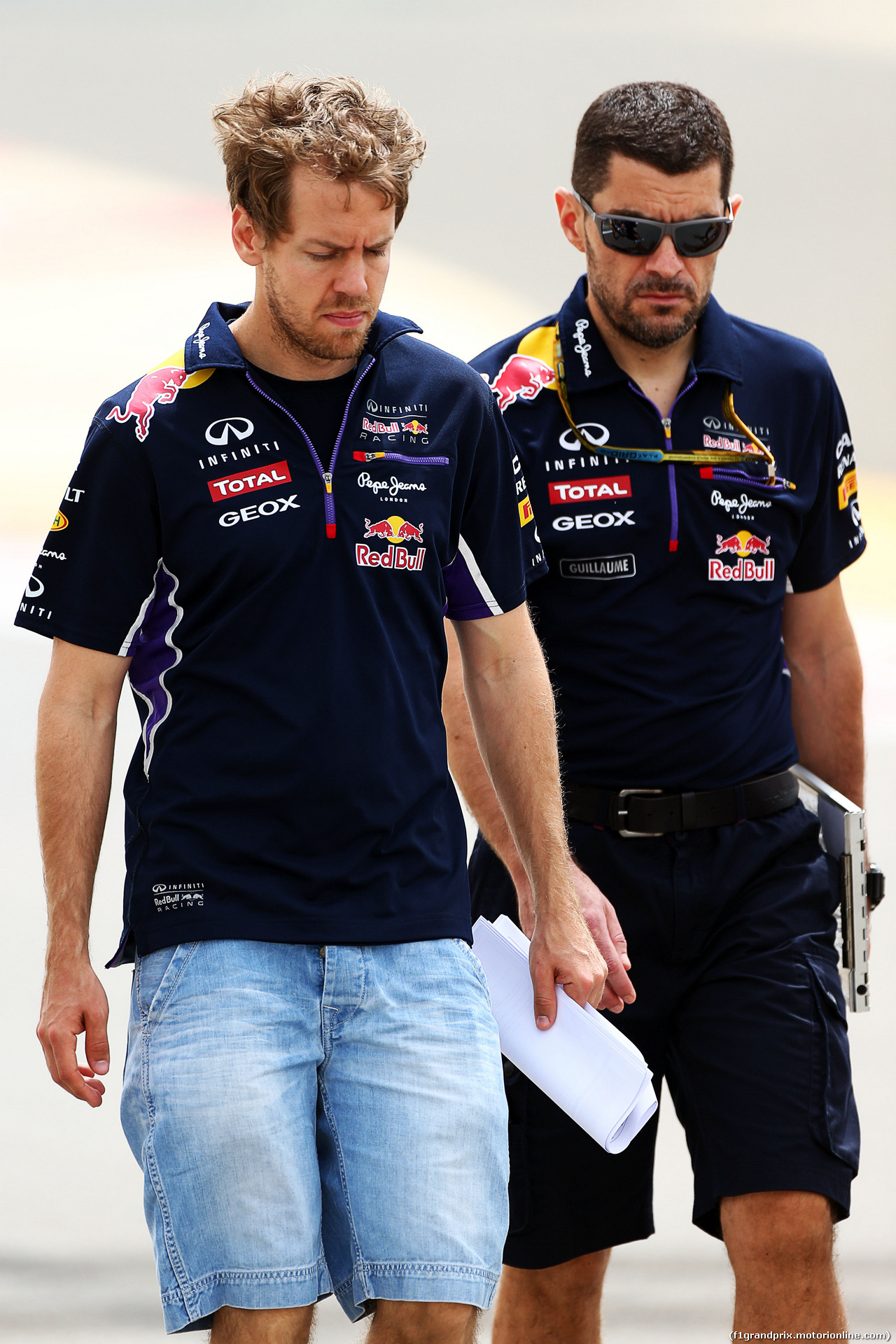 GP BAHRAIN, Sebastian Vettel (GER) Red Bull Racing walks the circuit with Guillaume Rocquelin (ITA) Red Bull Racing Gara Engineer.
03.04.2014. Formula 1 World Championship, Rd 3, Bahrain Grand Prix, Sakhir, Bahrain, Preparation Day.