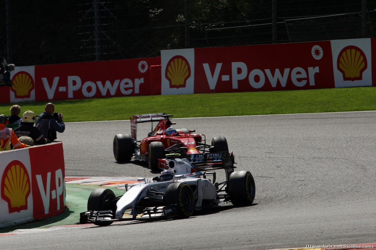 GP BELGIO, 24.08.2014- Gara, Valtteri Bottas (FIN) Williams F1 Team FW36 davanti a Kimi Raikkonen (FIN) Ferrari F14-T