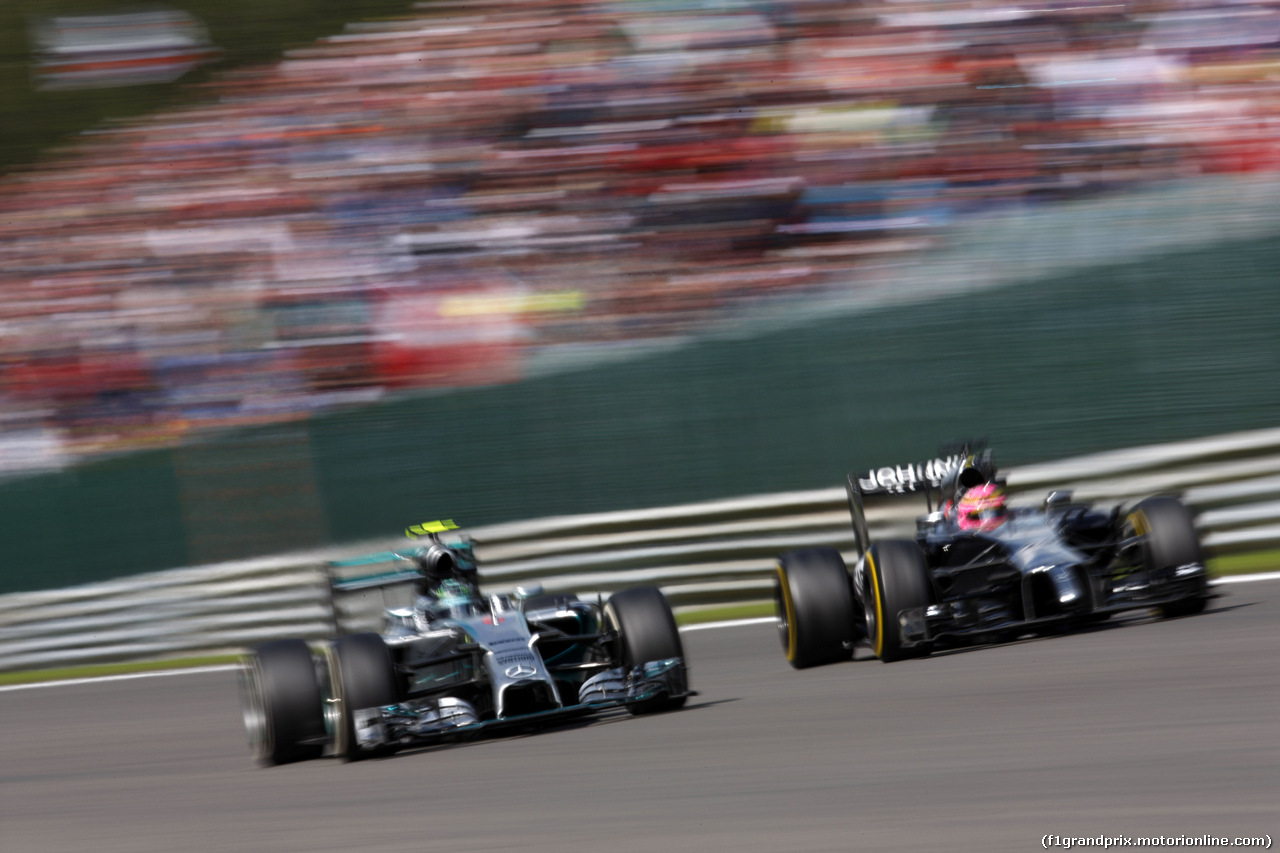 GP BELGIO, 24.08.2014- Gara, Nico Rosberg (GER) Mercedes AMG F1 W05 e Jenson Button (GBR) McLaren Mercedes MP4-29