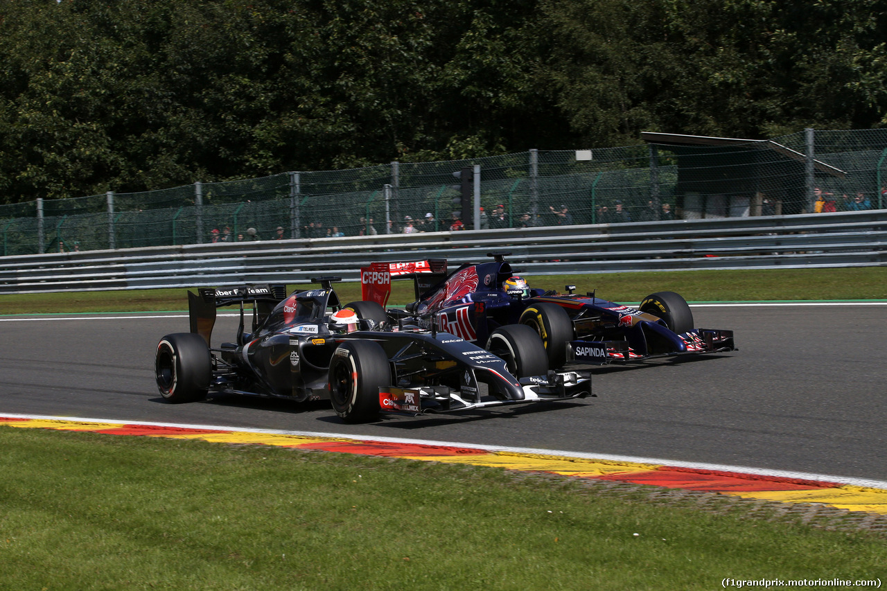 GP BELGIO, 24.08.2014-Gara, Adrian Sutil (GER) Sauber F1 Team C33 e Jean-Eric Vergne (FRA) Scuderia Toro Rosso STR9