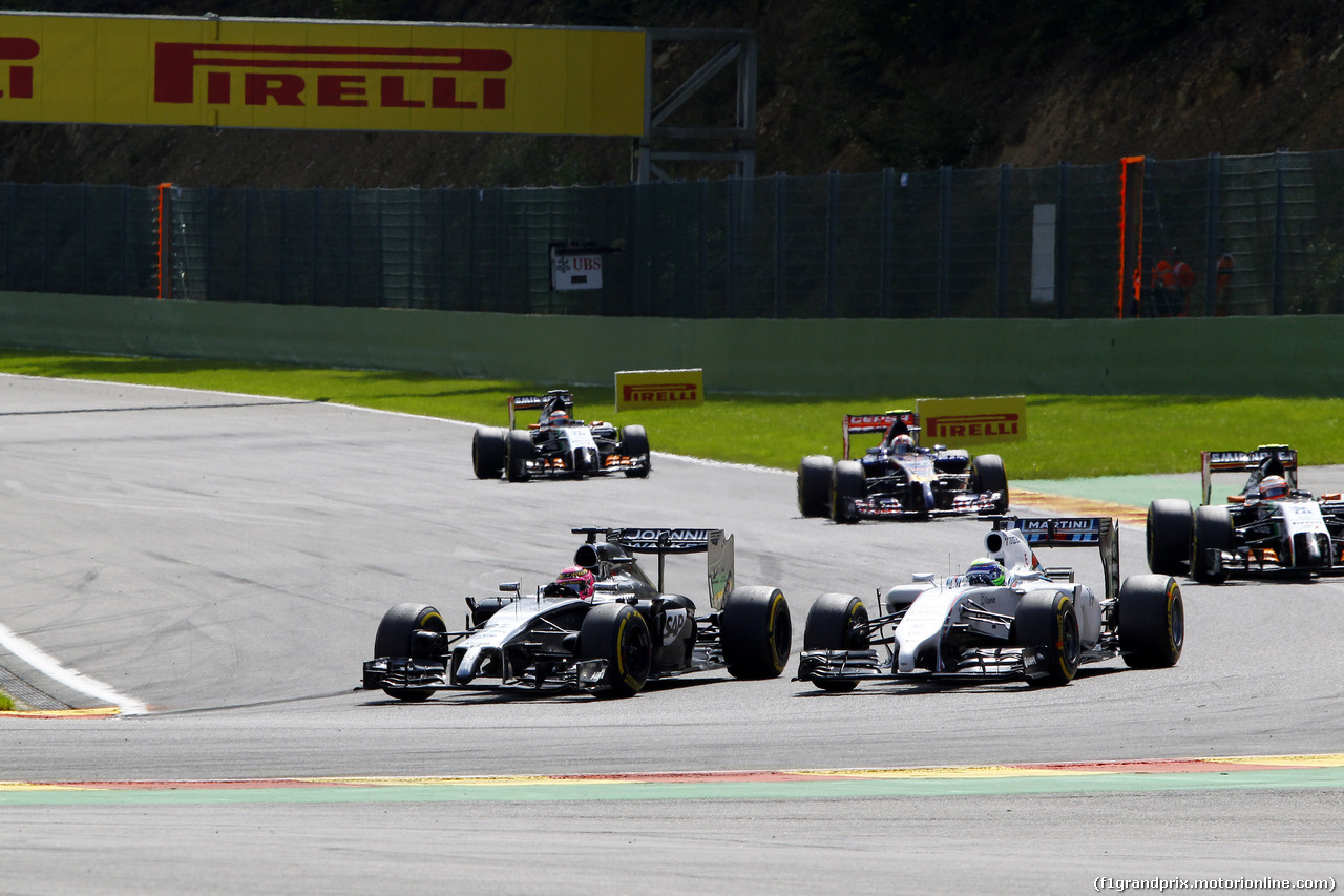 GP BELGIO, 24.08.2014- Gara, Jenson Button (GBR) McLaren Mercedes MP4-29 e Valtteri Bottas (FIN) Williams F1 Team FW36
