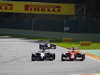 GP BELGIO, 24.08.2014- Gara, Kimi Raikkonen (FIN) Ferrari F14-T e Jenson Button (GBR) McLaren Mercedes MP4-29