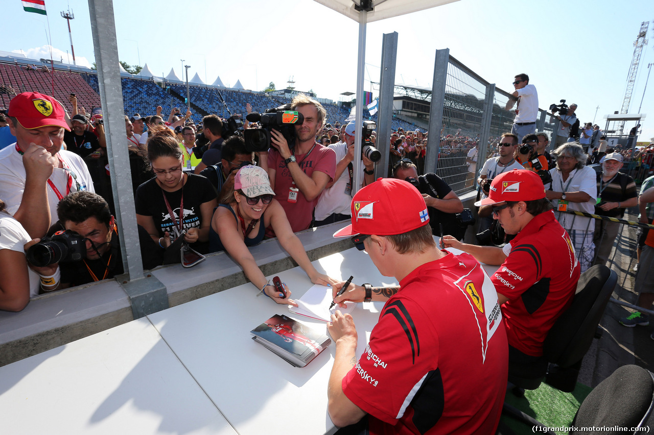 GP BELGIO, 24.07.2014- Autograph session, Kimi Raikkonen (FIN) Ferrari F14-T e Fernando Alonso (ESP) Ferrari F14-T