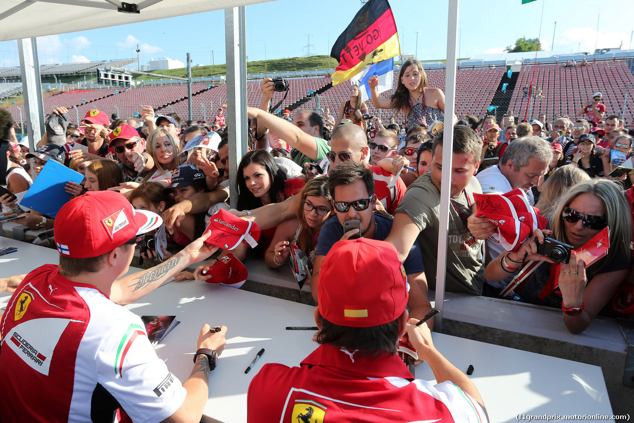 GP BELGIO, 24.07.2014- Autograph session, Kimi Raikkonen (FIN) Ferrari F14-T e Fernando Alonso (ESP) Ferrari F14-T