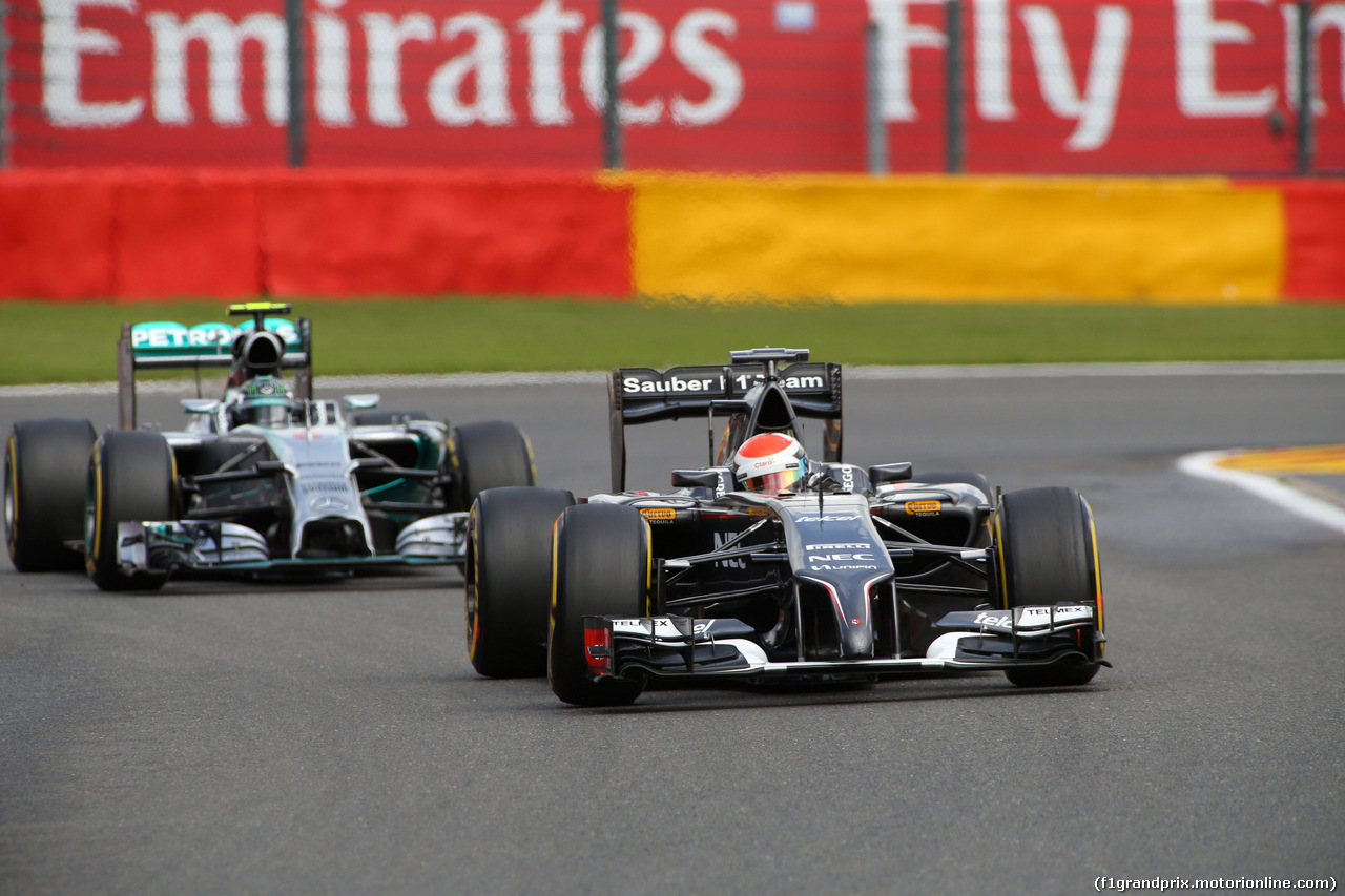 GP BELGIO, 23.08.2014- Prove Libere 3, Nico Rosberg (GER) Mercedes AMG F1 W05 e Adrian Sutil (GER) Sauber F1 Team C33
