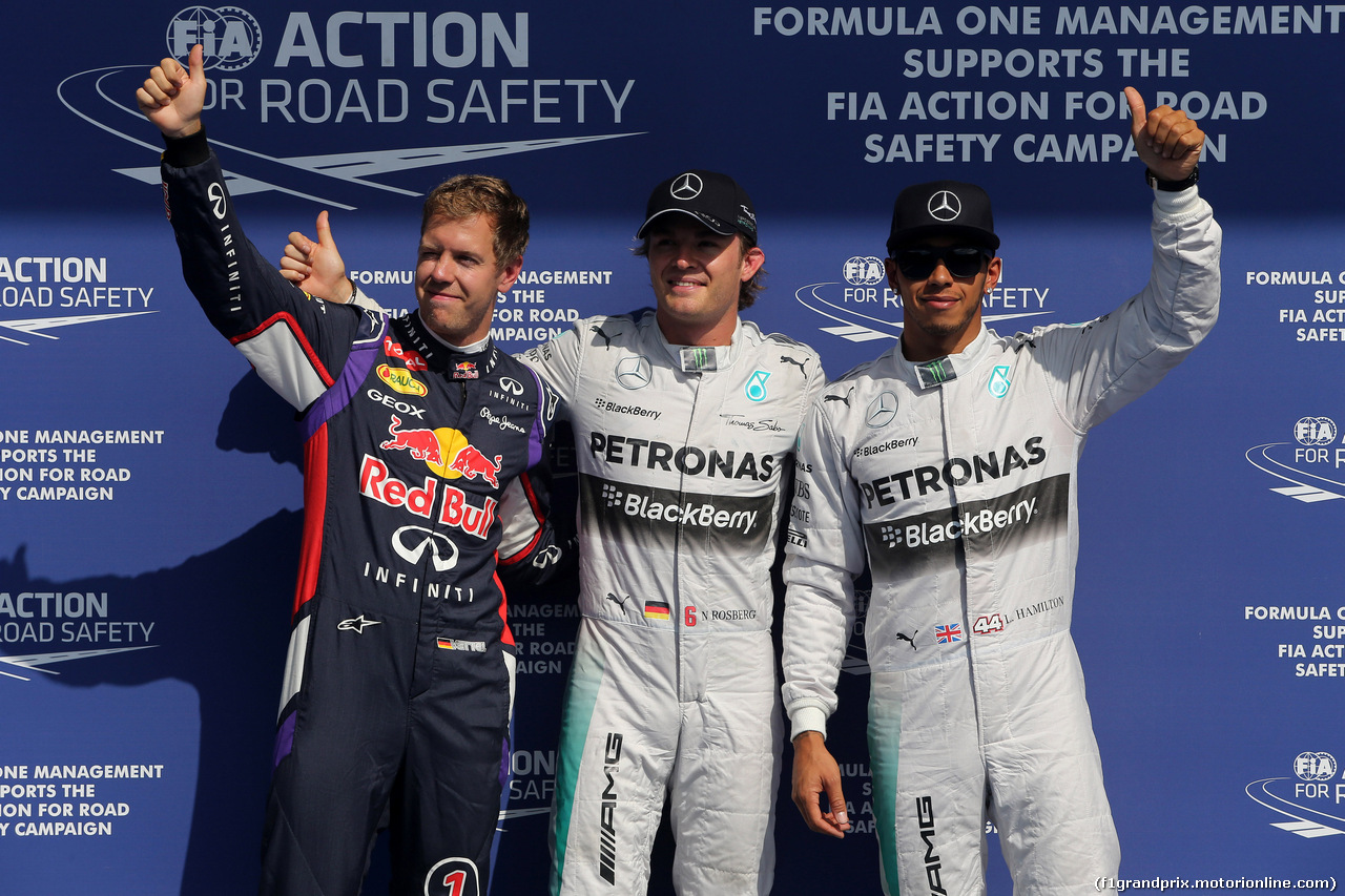 GP BELGIO, 23.08.2014- Qualifiche, terzo Sebastian Vettel (GER) Red Bull Racing RB10, Nico Rosberg (GER) Mercedes AMG F1 W05 pole position e secondo Lewis Hamilton (GBR) Mercedes AMG F1 W05