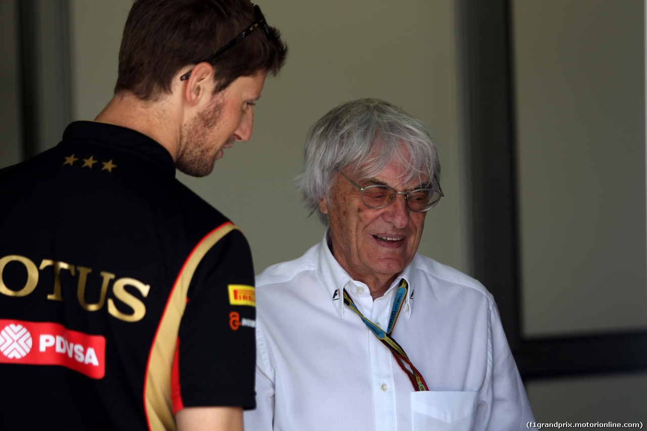 GP BRASILE, 09.11.2014 - Romain Grosjean (FRA) Lotus F1 Team E22 e Bernie Ecclestone (GBR), President e CEO of FOM