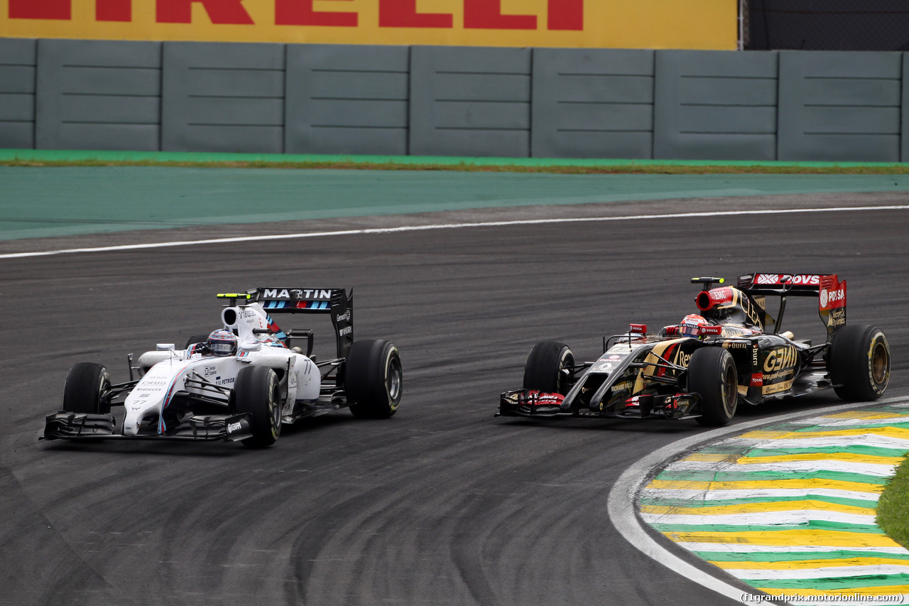 GP BRASILE, 09.11.2014 - Gara, Valtteri Bottas (FIN) Williams F1 Team FW36 e Pastor Maldonado (VEN) Lotus F1 Team E22