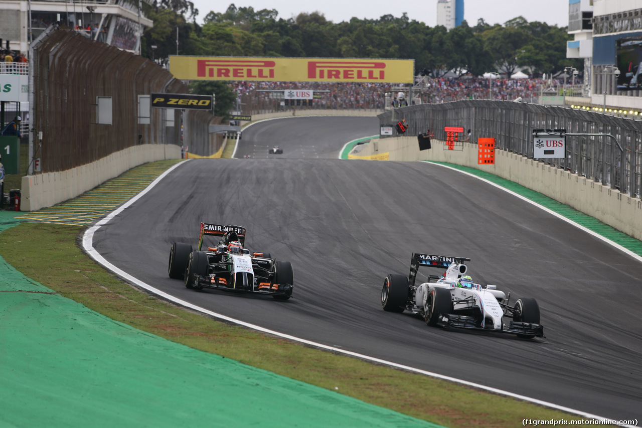 GP BRASILE, 09.11.2014 - Gara, Nico Hulkenberg (GER) Sahara Force India F1 VJM07 e Felipe Massa (BRA) Williams F1 Team FW36