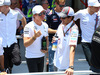 GP BRASILE, 09.11.2014 - Nico Rosberg (GER) Mercedes AMG F1 W05 e Adrian Sutil (GER) Sauber F1 Team C33