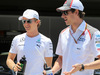 GP BRASILE, 09.11.2014 - Nico Rosberg (GER) Mercedes AMG F1 W05 e Adrian Sutil (GER) Sauber F1 Team C33