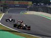 GP BRASILE, 09.11.2014 - Gara, Pastor Maldonado (VEN) Lotus F1 Team E22 davanti a Esteban Gutierrez (MEX), Sauber F1 Team C33