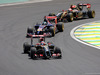 GP BRASILE, 09.11.2014 - Gara, Romain Grosjean (FRA) Lotus F1 Team E22 davanti a Jean-Eric Vergne (FRA) Scuderia Toro Rosso STR9
