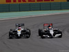 GP BRASILE, 09.11.2014 - Gara, Jenson Button (GBR) McLaren Mercedes MP4-29 e Adrian Sutil (GER) Sauber F1 Team C33