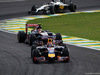 GP BRASILE, 09.11.2014 - Gara, Sebastian Vettel (GER) Red Bull Racing RB10 davanti a Daniil Kvyat (RUS) Scuderia Toro Rosso STR9