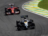 GP BRASILE, 09.11.2014 - Gara, Kevin Magnussen (DEN) McLaren Mercedes MP4-29 davanti a Fernando Alonso (ESP) Ferrari F14-T