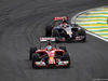 GP BRASILE, 09.11.2014 - Gara, Kimi Raikkonen (FIN) Ferrari F14-T davanti a Daniil Kvyat (RUS) Scuderia Toro Rosso STR9