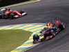 GP BRASILE, 09.11.2014 - Gara, Daniel Ricciardo (AUS) Red Bull Racing RB10 davanti a Kimi Raikkonen (FIN) Ferrari F14-T