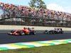 GP BRASILE, 09.11.2014 - Gara, Kimi Raikkonen (FIN) Ferrari F14-T e Esteban Gutierrez (MEX), Sauber F1 Team C33