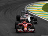 GP BRASILE, 09.11.2014 - Gara, Kimi Raikkonen (FIN) Ferrari F14-T e Jenson Button (GBR) McLaren Mercedes MP4-29