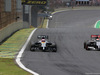 GP BRASILE, 09.11.2014 - Gara, Jenson Button (GBR) McLaren Mercedes MP4-29 e Adrian Sutil (GER) Sauber F1 Team C33