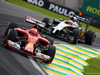 GP BRASILE, 09.11.2014 - Gara, Kimi Raikkonen (FIN) Ferrari F14-T e Jenson Button (GBR) McLaren Mercedes MP4-29