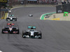 GP BRASILE, 09.11.2014 - Gara, Daniil Kvyat (RUS) Scuderia Toro Rosso STR9 e Nico Rosberg (GER) Mercedes AMG F1 W05