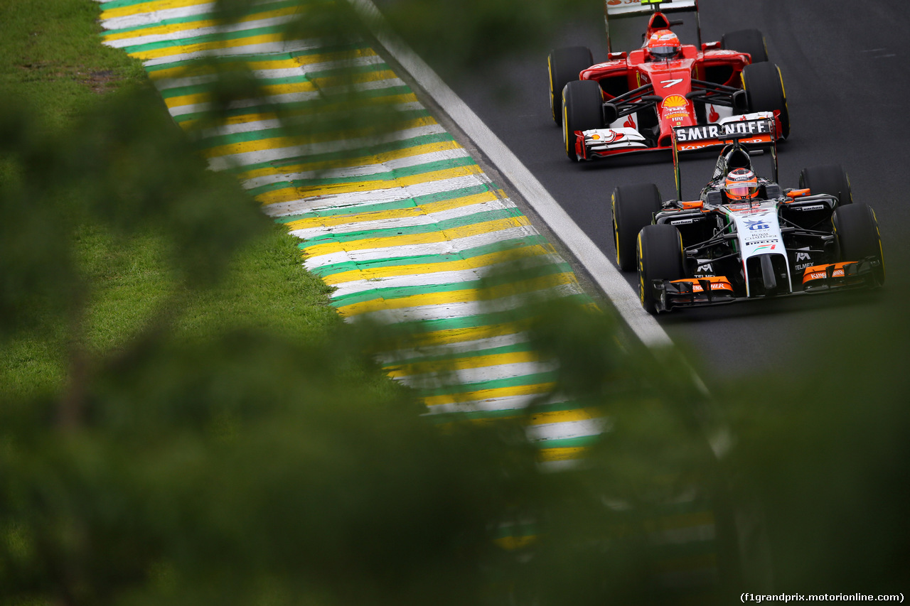 GP BRASILE, 08.11.2014 - Qualifiche, Nico Hulkenberg (GER) Sahara Force India F1 VJM07 e Kimi Raikkonen (FIN) Ferrari F14-T