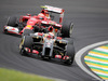 GP BRASILE, 08.11.2014 - Free Practice 3, Romain Grosjean (FRA) Lotus F1 Team E22 davanti a Kimi Raikkonen (FIN) Ferrari F14-T