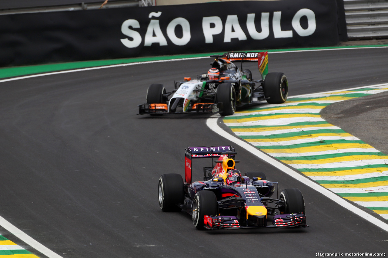 GP BRASILE, 07.11.2014 - Prove Libere 1, Sebastian Vettel (GER) Red Bull Racing RB10 davanti a Nico Hulkenberg (GER) Sahara Force India F1 VJM07