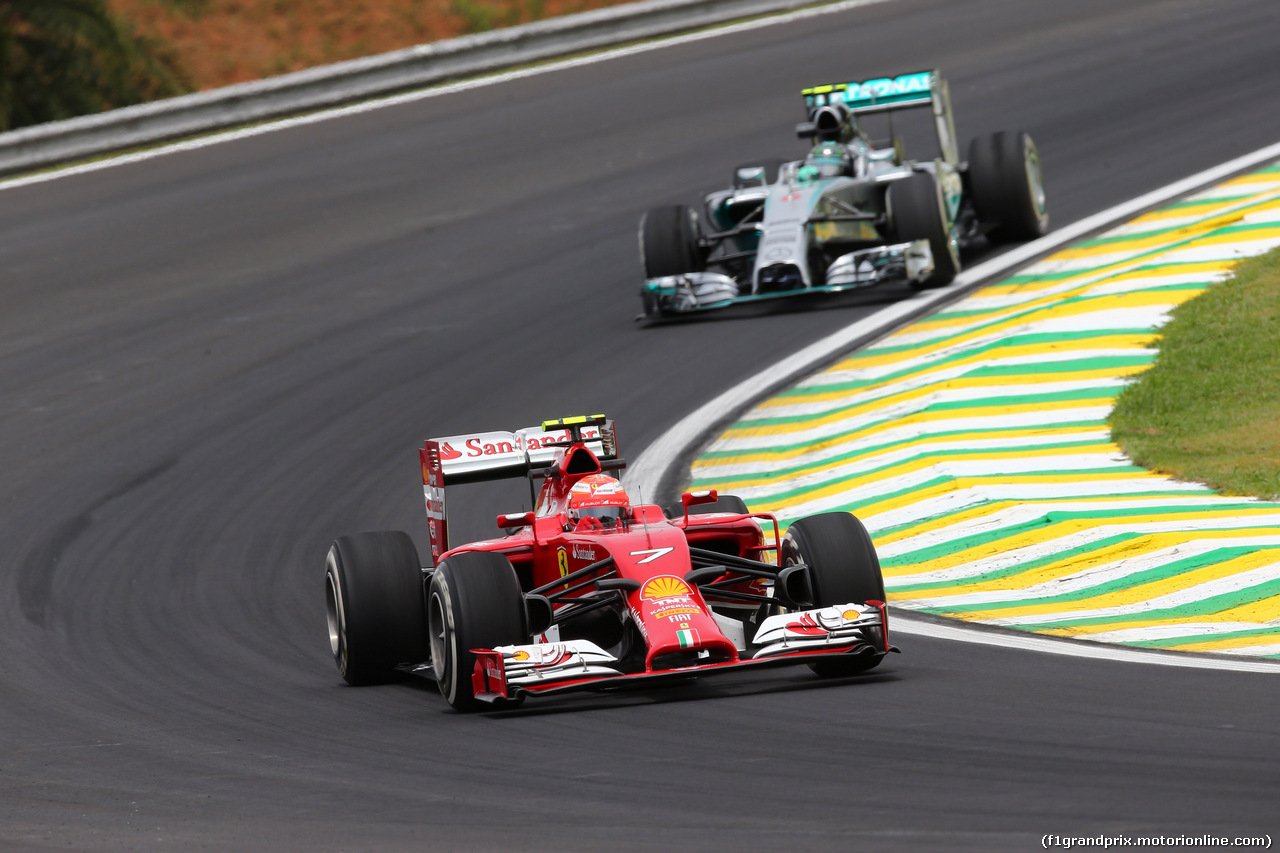 GP BRASILE, 07.11.2014 - Prove Libere 1, Kimi Raikkonen (FIN) Ferrari F14-T davanti a Nico Rosberg (GER) Mercedes AMG F1 W05