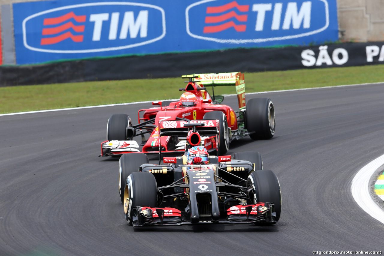 GP BRASILE, 07.11.2014 - Prove Libere 1, Romain Grosjean (FRA) Lotus F1 Team E22 davanti a Kimi Raikkonen (FIN) Ferrari F14-T