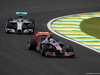 GP BRASILE, 07.11.2014 - Free Practice 1, Daniil Kvyat (RUS) Scuderia Toro Rosso STR9 davanti a Nico Rosberg (GER) Mercedes AMG F1 W05