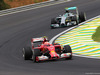 GP BRASILE, 07.11.2014 - Free Practice 1, Kimi Raikkonen (FIN) Ferrari F14-T davanti a Nico Rosberg (GER) Mercedes AMG F1 W05