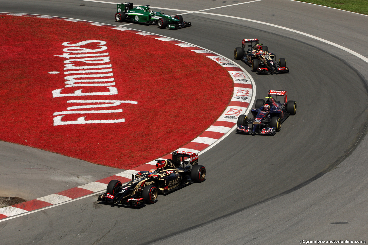 GP CANADA, 08.06.2014- Gara, Romain Grosjean (FRA) Lotus F1 Team E22 davanti a Daniil Kvyat (RUS) Scuderia Toro Rosso STR9