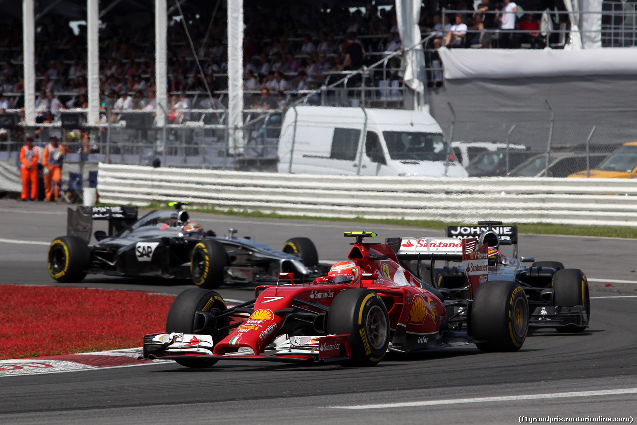 GP CANADA, 08.06.2014- Gara, Kimi Raikkonen (FIN) Ferrari F14-T davanti a Jenson Button (GBR) McLaren Mercedes MP4-29