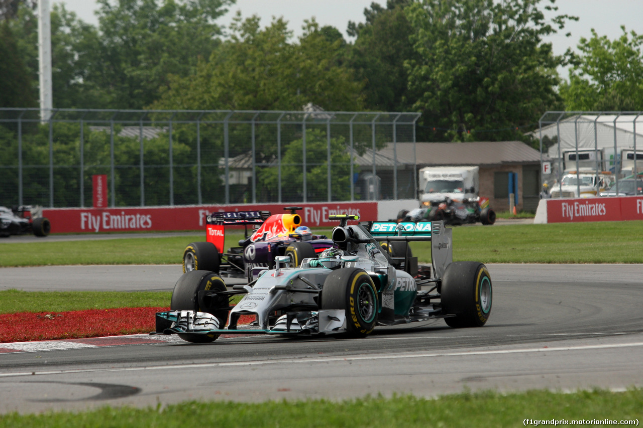 GP CANADA, 08.06.2014- Gara, Nico Rosberg (GER) Mercedes AMG F1 W05 davanti a Sebastian Vettel (GER) Red Bull Racing RB10