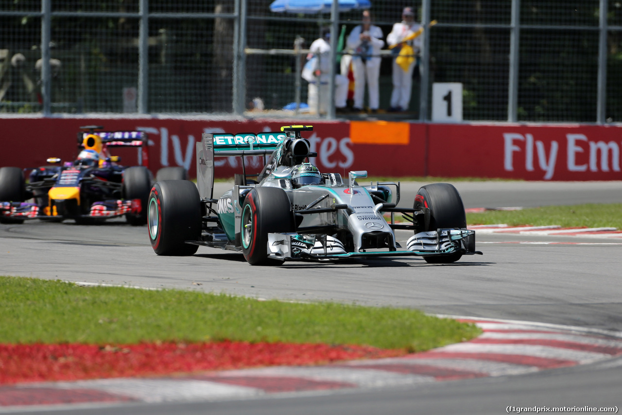 GP CANADA, 08.06.2014- Gara, Nico Rosberg (GER) Mercedes AMG F1 W05 davanti a Sebastian Vettel (GER) Red Bull Racing RB10