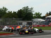 GP CANADA, 08.06.2014- Gara, Sebastian Vettel (GER) Red Bull Racing RB10 pass Sergio Perez (MEX) Sahara Force India F1 VJM07