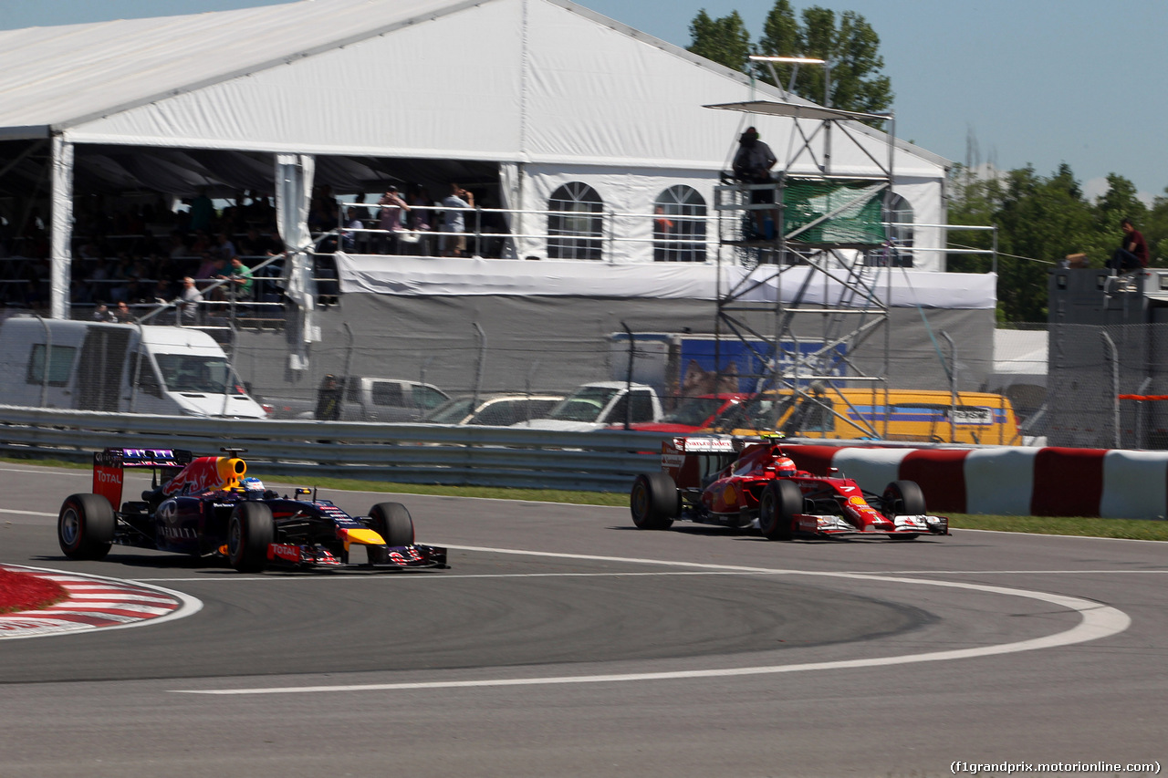 GP CANADA, 07.06.2014- Prove Libere 3, Sebastian Vettel (GER) Red Bull Racing RB10 andKimi Raikkonen (FIN) Ferrari F14-T