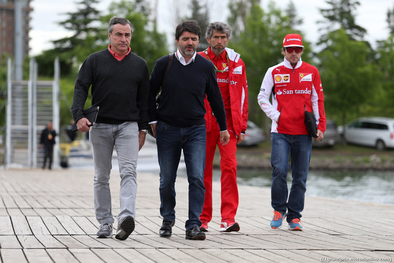 GP CANADA, 06.06.2014- (L-R) Carlos Sainz (ESP) Ex WRC Champion, Luis Garcia Abad (ESP), manager of Fernando Alonso (ESP) e Fernando Alonso (ESP) Ferrari F14-T