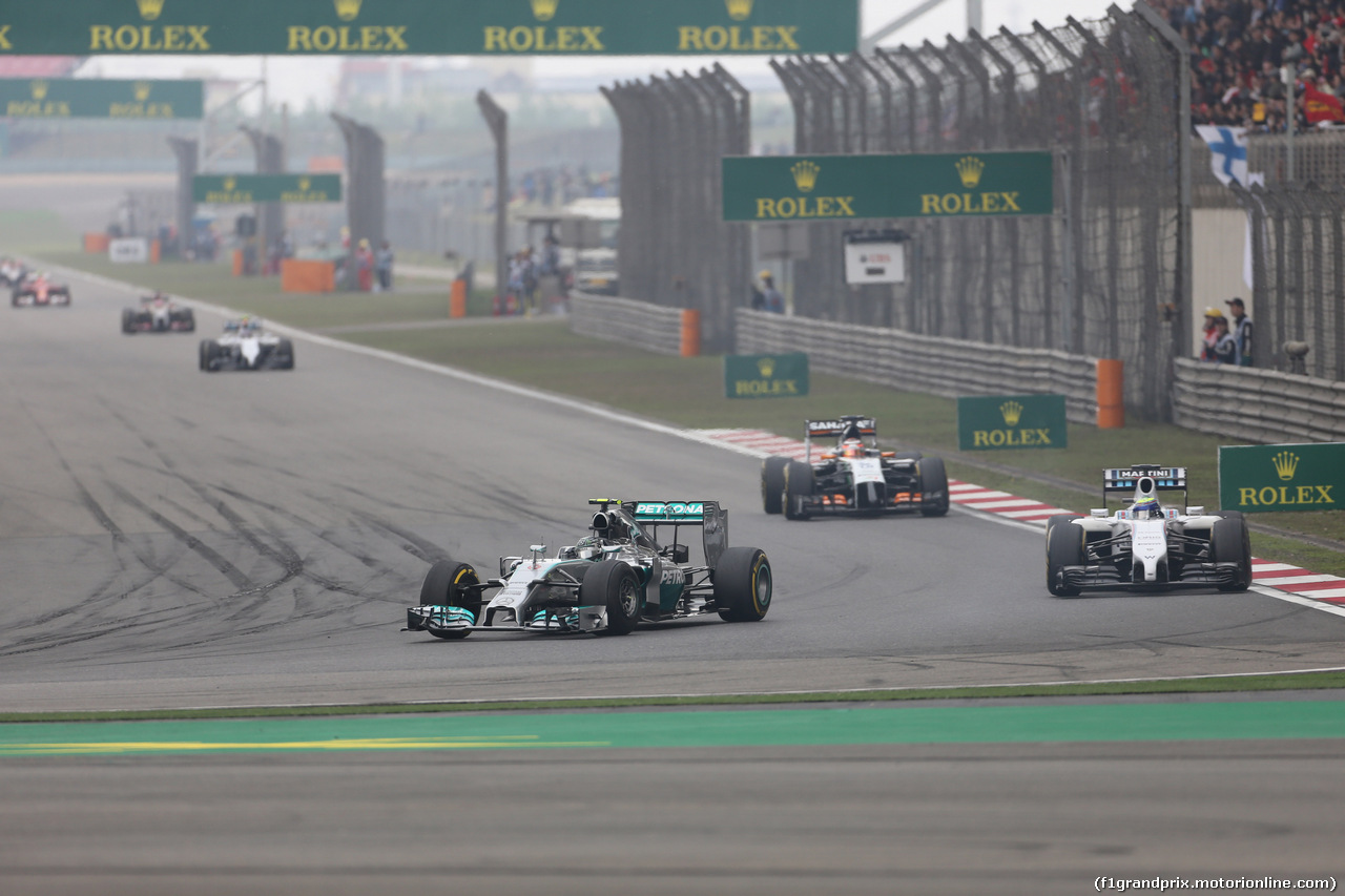 GP CINA, 20.04.2014- Gara, Nico Rosberg (GER) Mercedes AMG F1 W05 e Felipe Massa (BRA) Williams F1 Team FW36