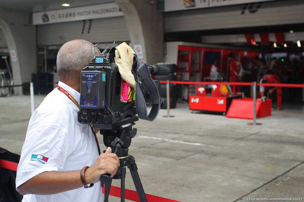 GP CINA, 17.04.2014- Cameramen in front of Ferrari Garage