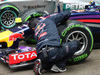 GP CINA, 19.04.2014- Redbull mechanic is placing cooler on Sebastian Vettel (GER) Infiniti Red Bull Racing RB10 car in parc fermee