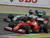 GP GERMANIA, 20.07.2014- Gara, the fight btween Kimi Raikkonen (FIN) Ferrari F14T e Lewis Hamilton (GBR) Mercedes AMG F1 W05
