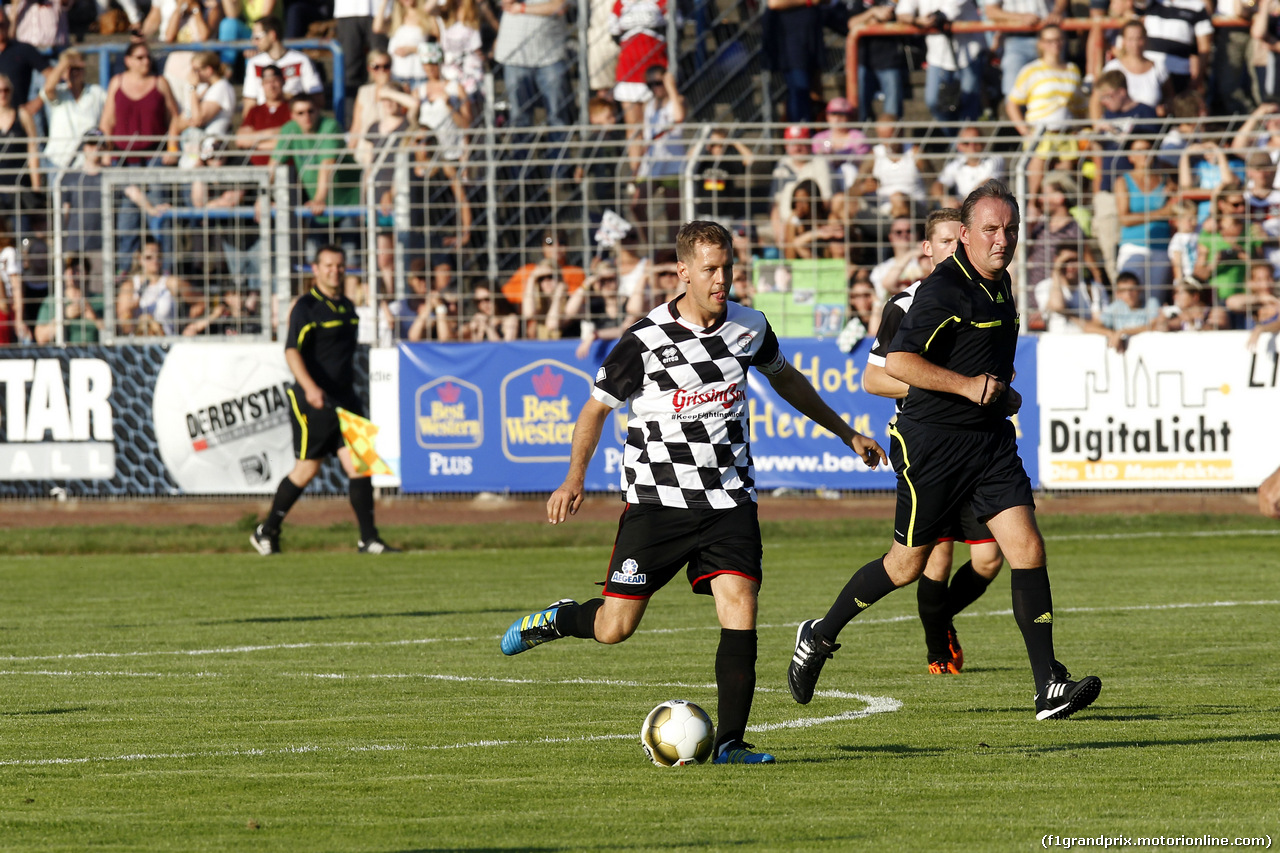 GP GERMANIA, Sebastian Vettel (GER) Red Bull Racing, Kick f¸r Kinder at Hanau. 
16.07.2014. Formula 1 World Championship, Rd 10, German Grand Prix, Hockenheim, Germany, Wednesday Soccer.
